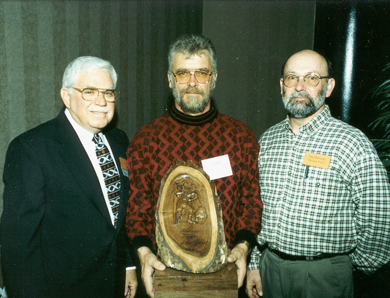 Left to right: Robert Burke-Indiana Tree Farm Chairman, Steve Close-Logger of the Year, Joe Davison-nominating forester.